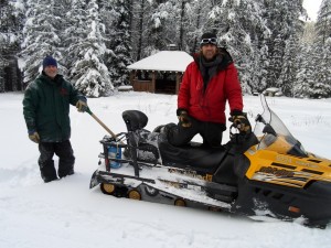 Jeff and Andrew had taken a break from grooming the trail to sweep and shovel around the picnic shelter at the divide