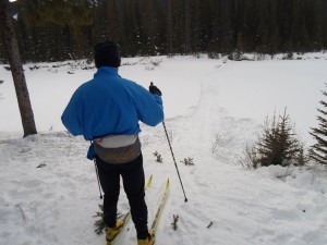 Chip contemplates whether he really wants to ski onto the Bow River