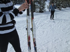 Scott's skis with clumps of snow