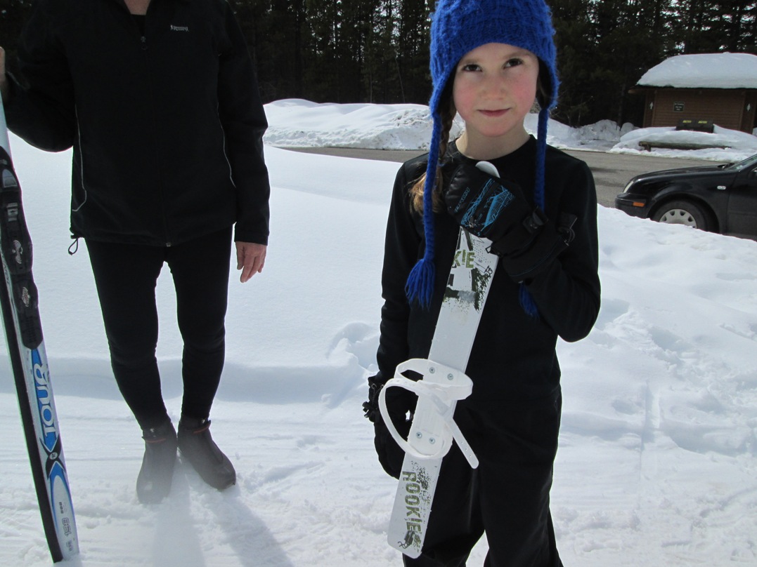 Marin holds up the ski she found at Boulton creek