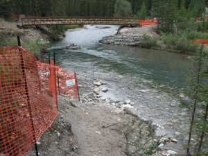 Spray river bridge appears to be connected at both ends but is still closed pending completion of all repairs