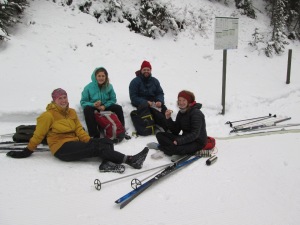 This group of lunching skiers had already accomplished 2K on Elk pass. 