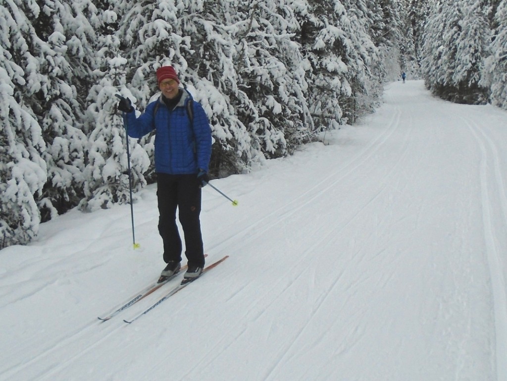 A happy skier descending the big hill on Cascade valley. 