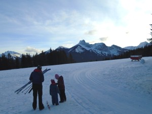 A family gets ready to go skiing at Kananaskis village