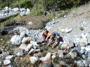 Getting refreshed at a cold mountain stream