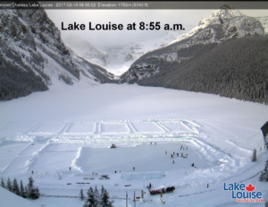 Clearing the snow from the skating rink at Lake Louise